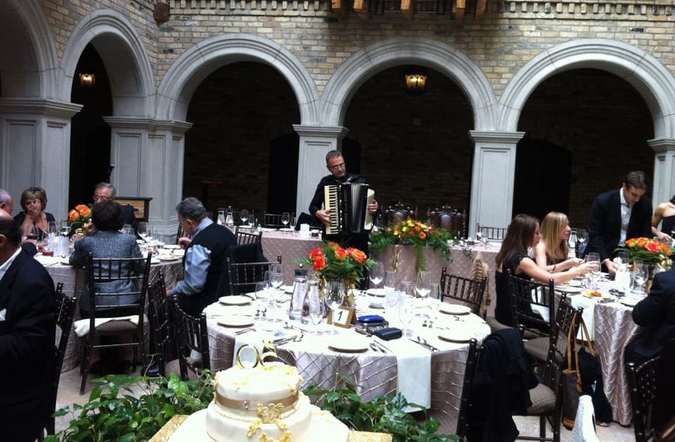 Frank Baggetta performing piano at a corporate gala in the GTA